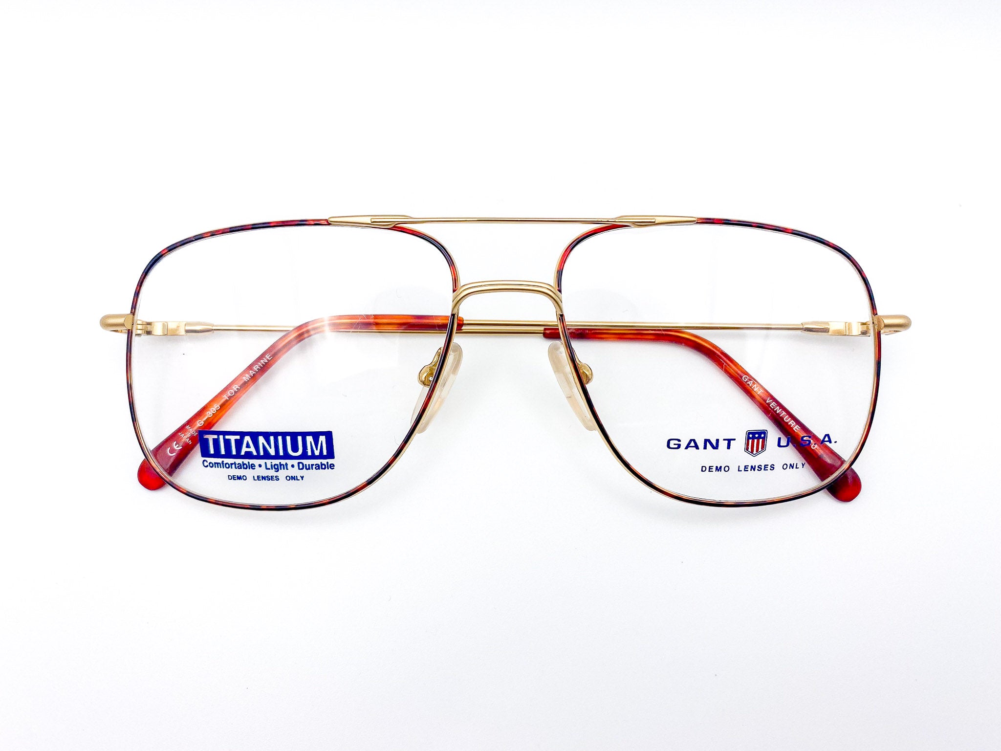 Vintage Gant tortoiseshell aviator glasses with a gold frame on a white background