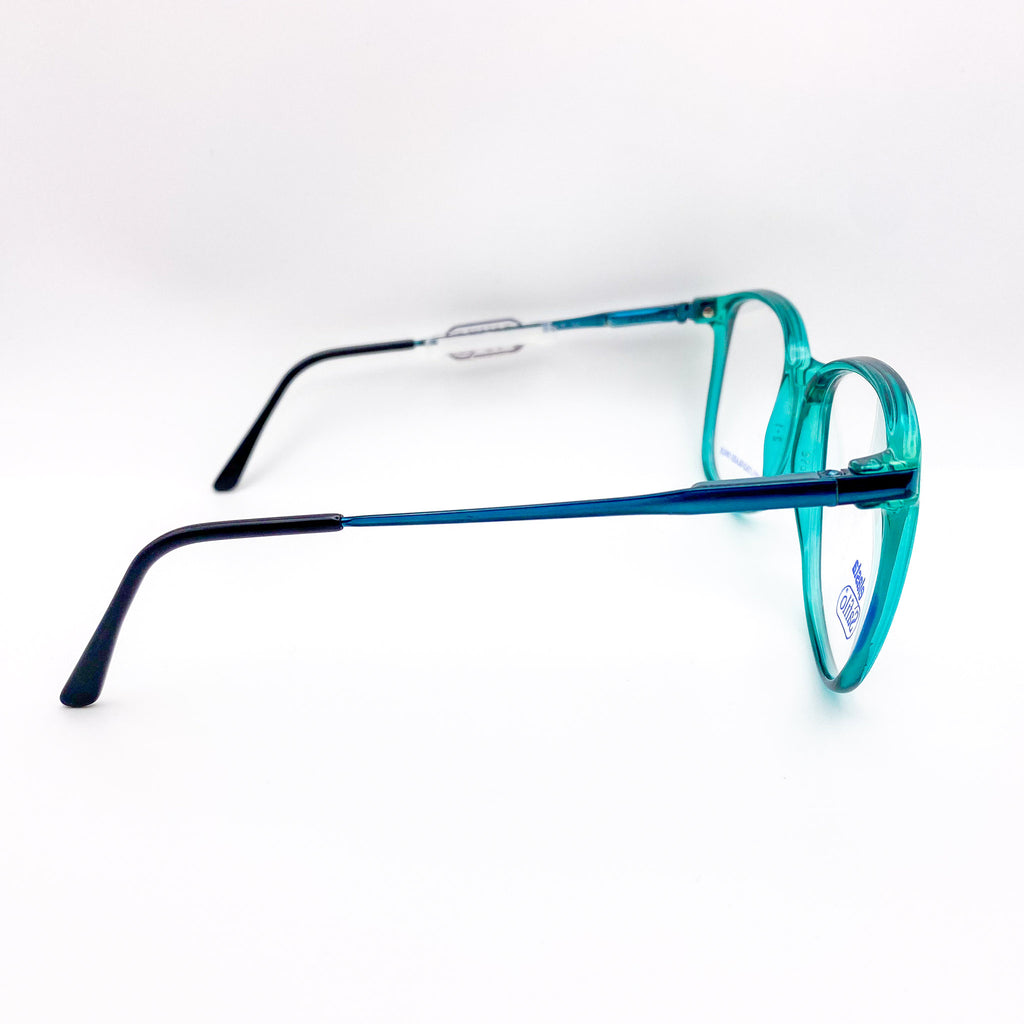 Vintage teal green eyeglasses on a white background