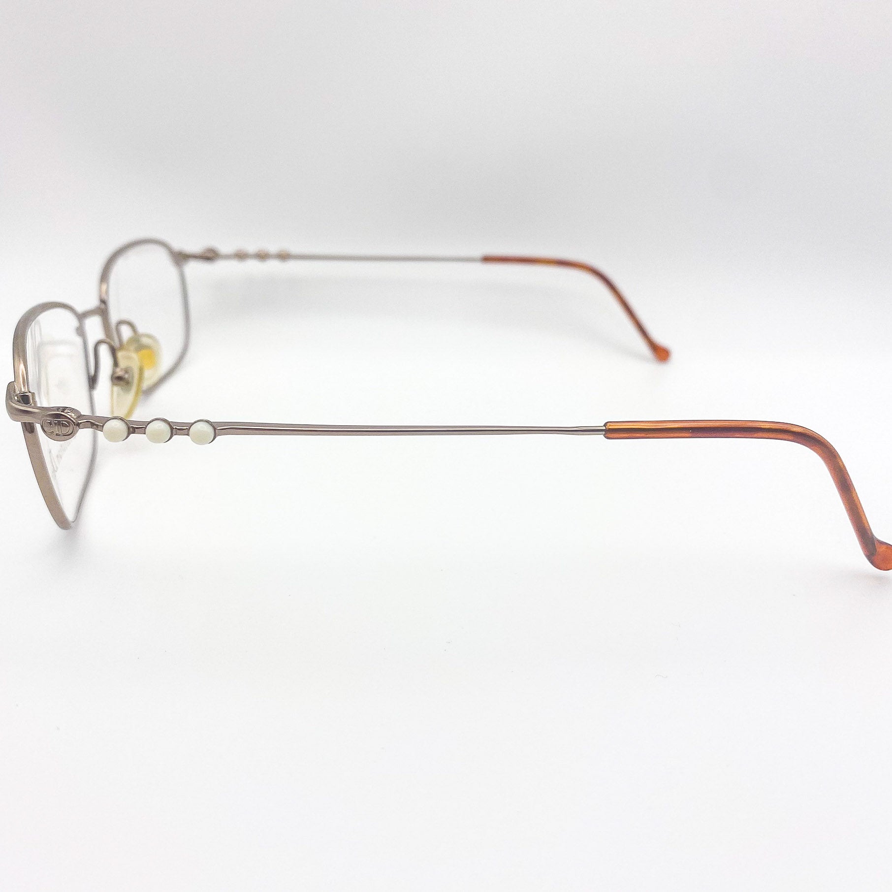 Eyeglasses with a metallic frame on a white background