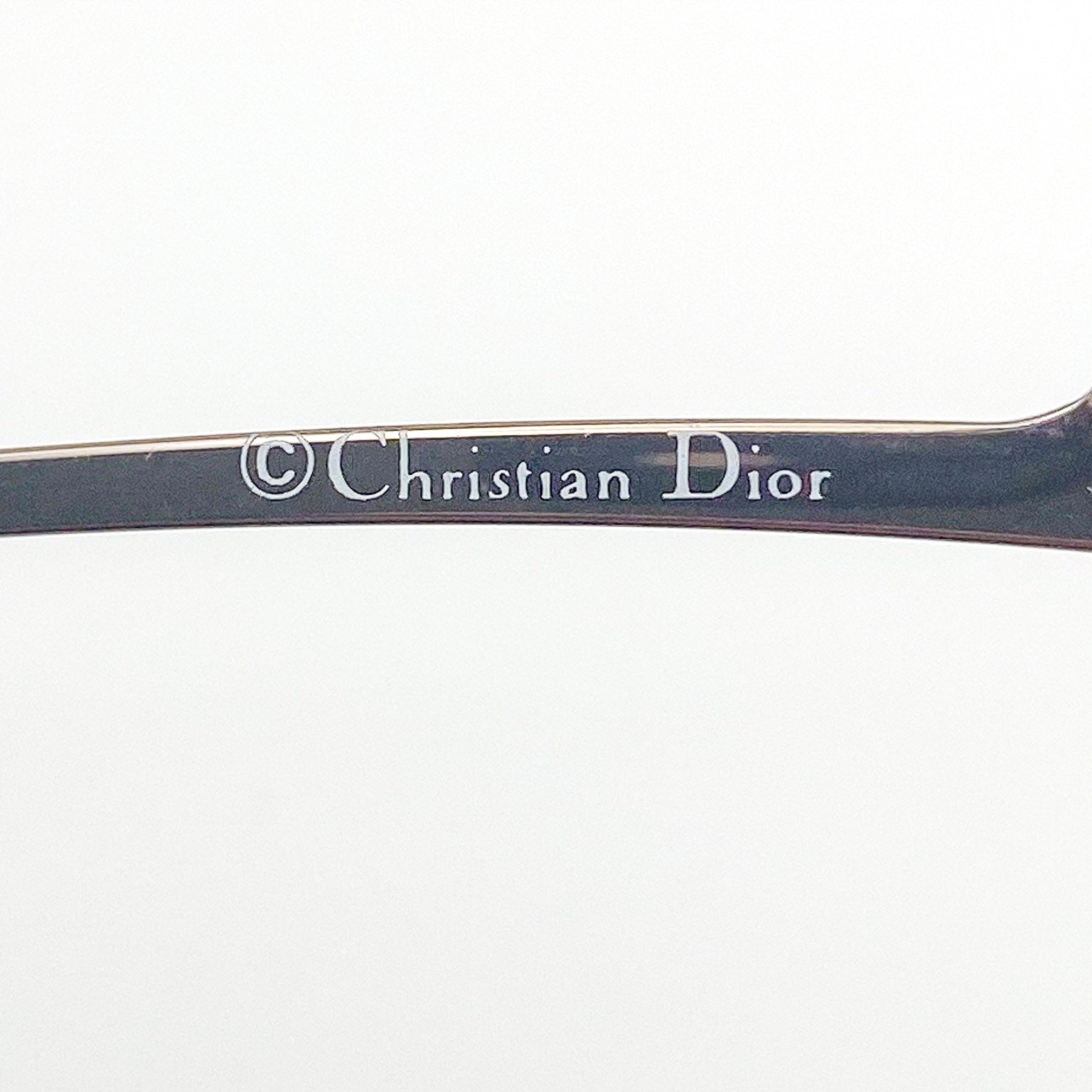 Christian Dior logo on a white background