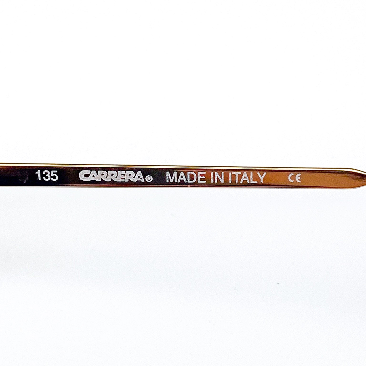 Carrera eyeglasses frame with 'Made in Italy' text on a white background