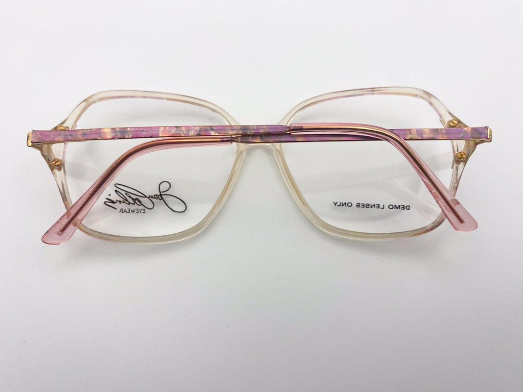1980s pink and gold grandma glasses on a white background