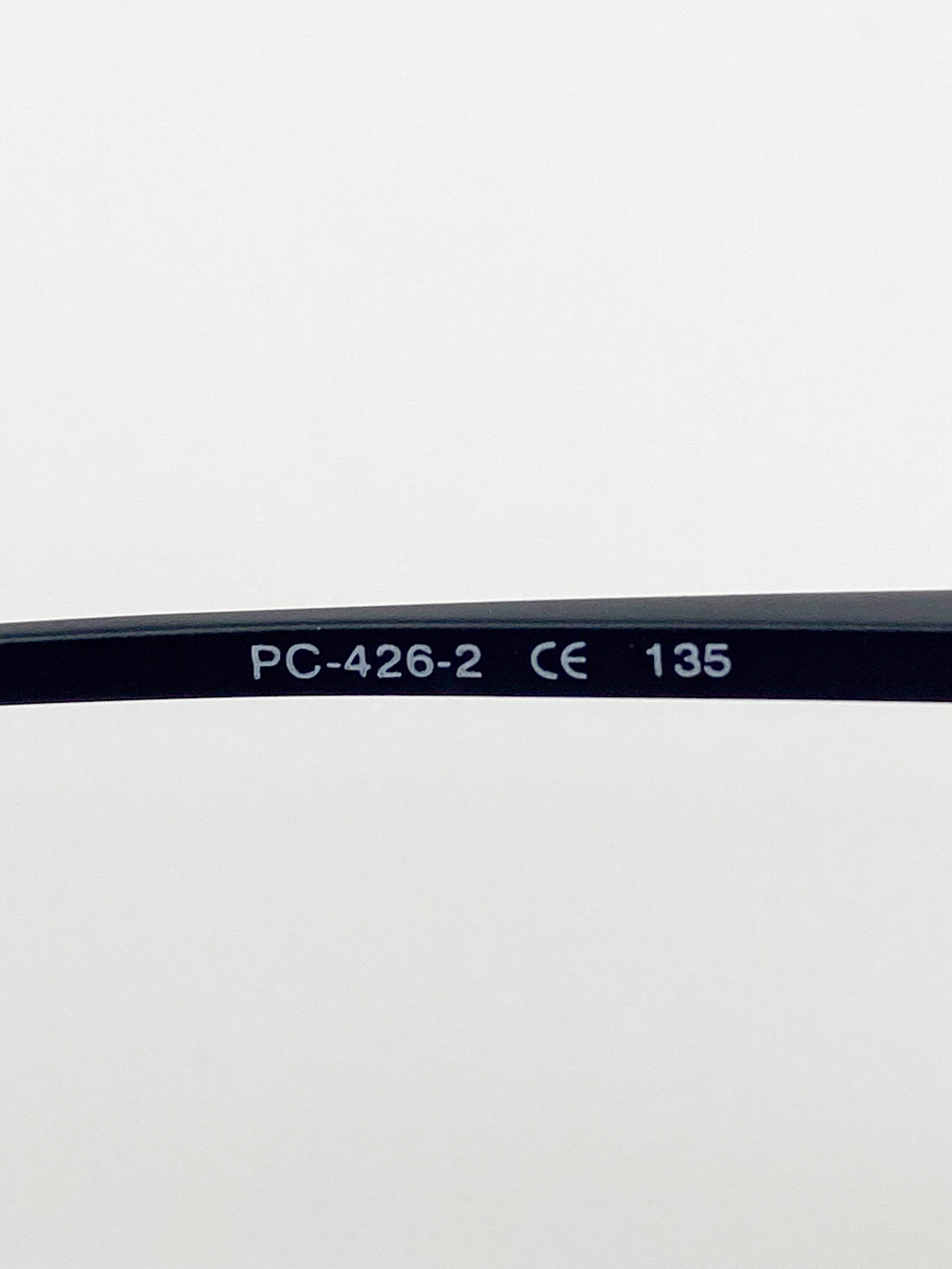 Black eyeglass stem with 'PC-426-2', 'CE', and '135' text on a white background