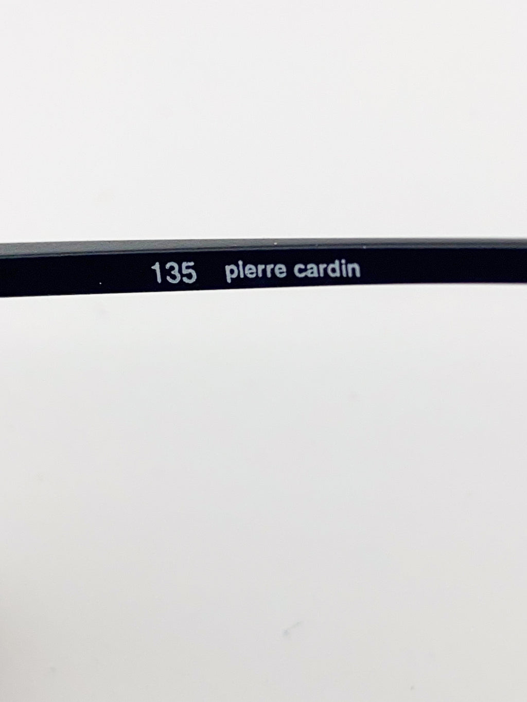 Pierre Cardin eyeglass frame on a white background