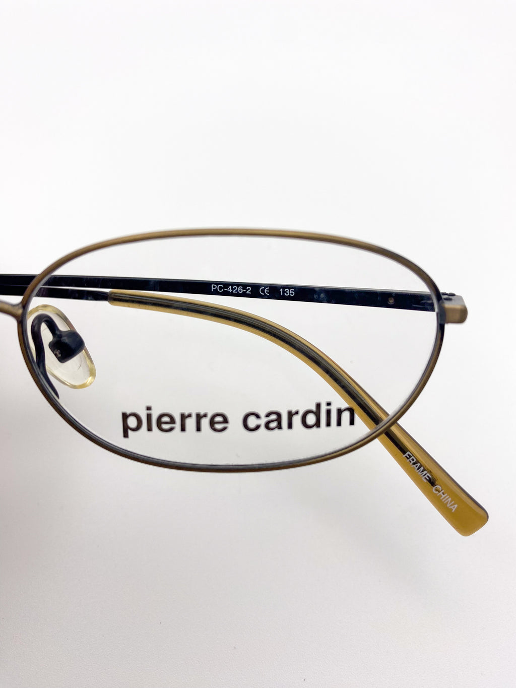 Pierre Cardin eyeglasses on a white background