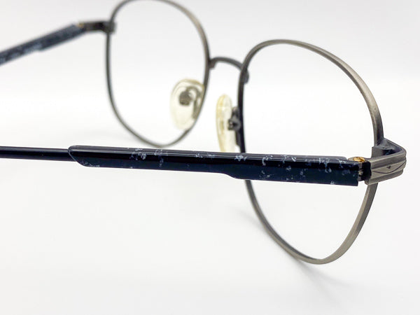 Close-up of eyeglasses with a white background