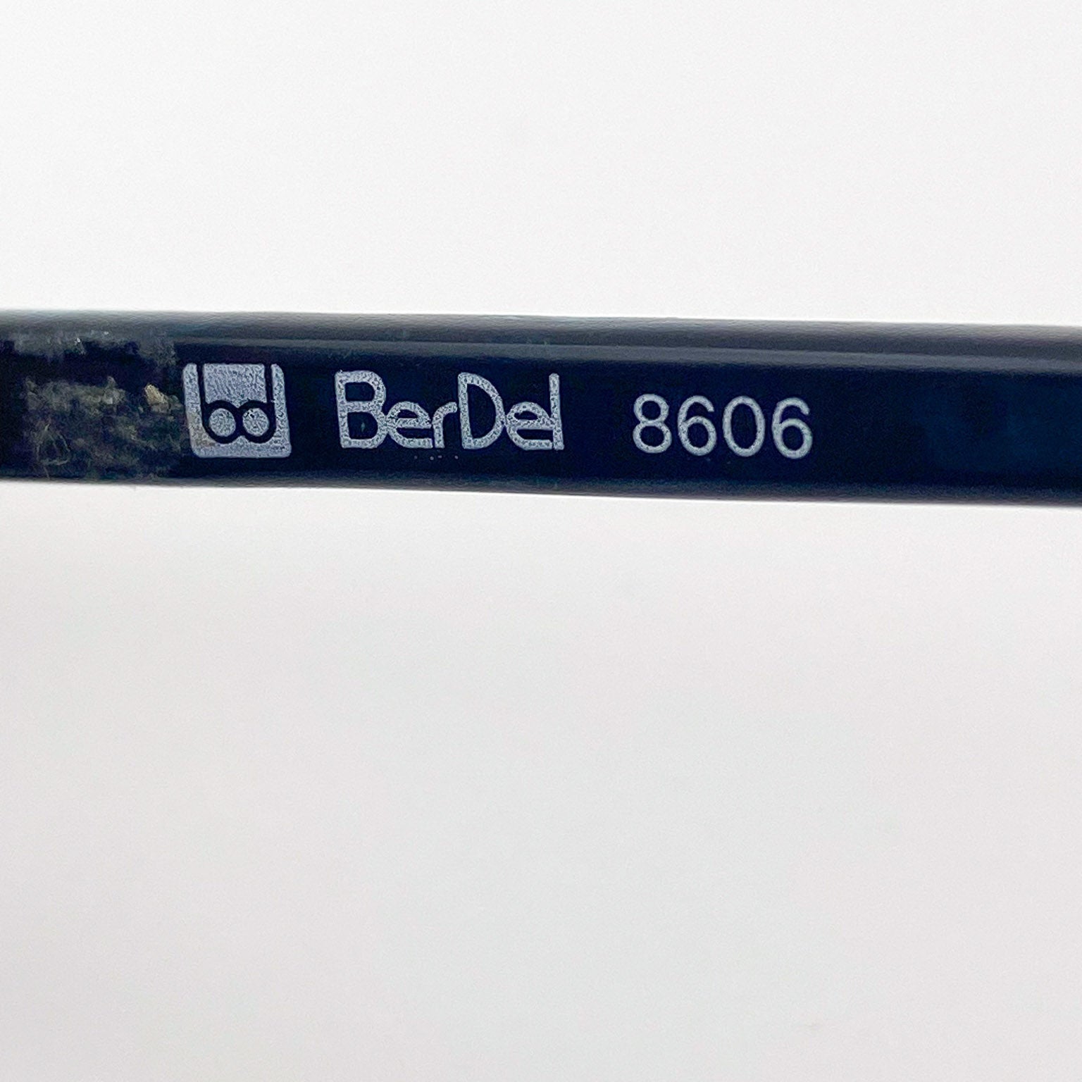Close-up of a BerDel product with the number 8606 on a white background