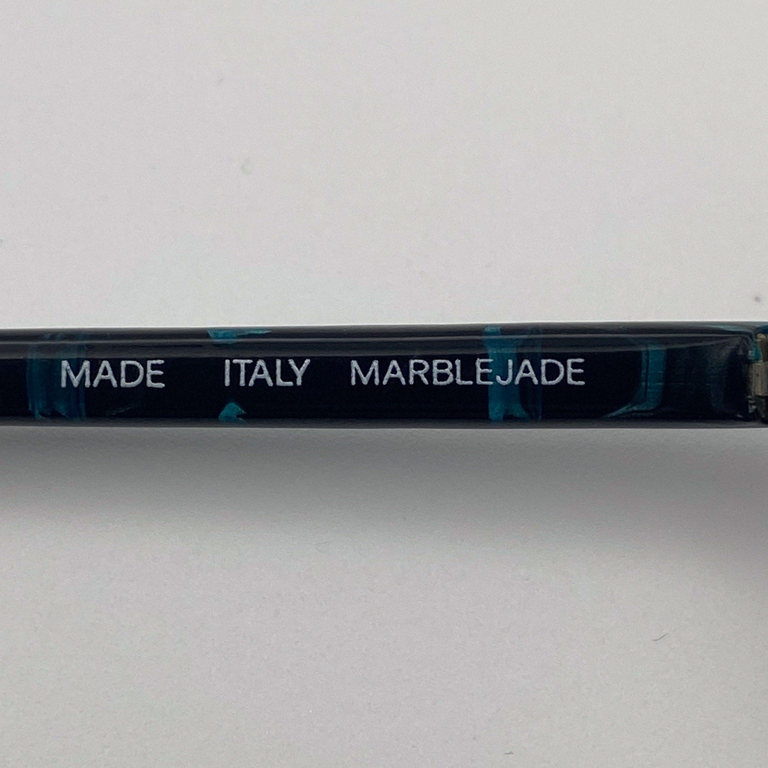 Marblejade temple arm with 'Made Italy' text on a white background