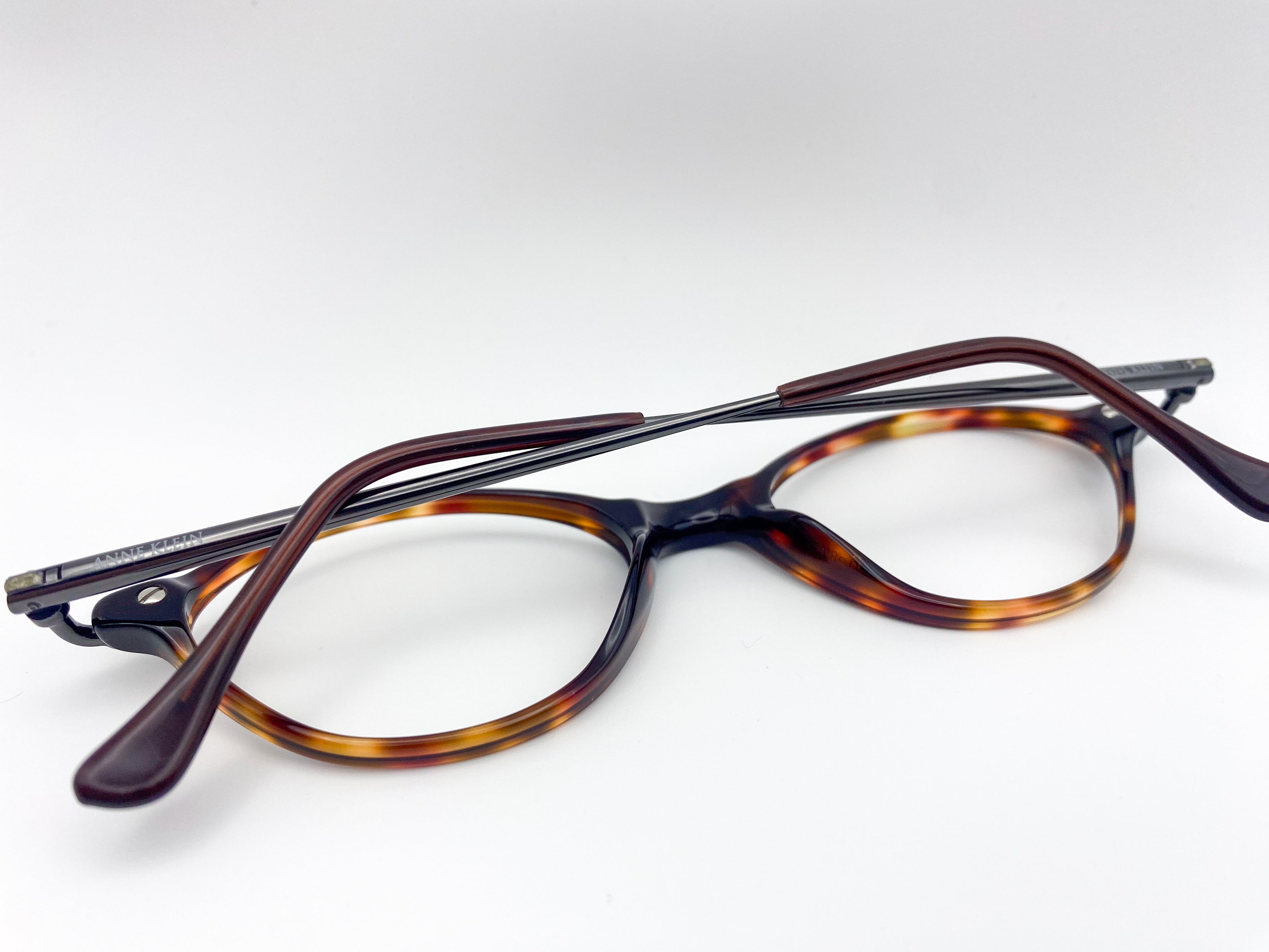 Eyeglasses with tortoiseshell frame on a white background