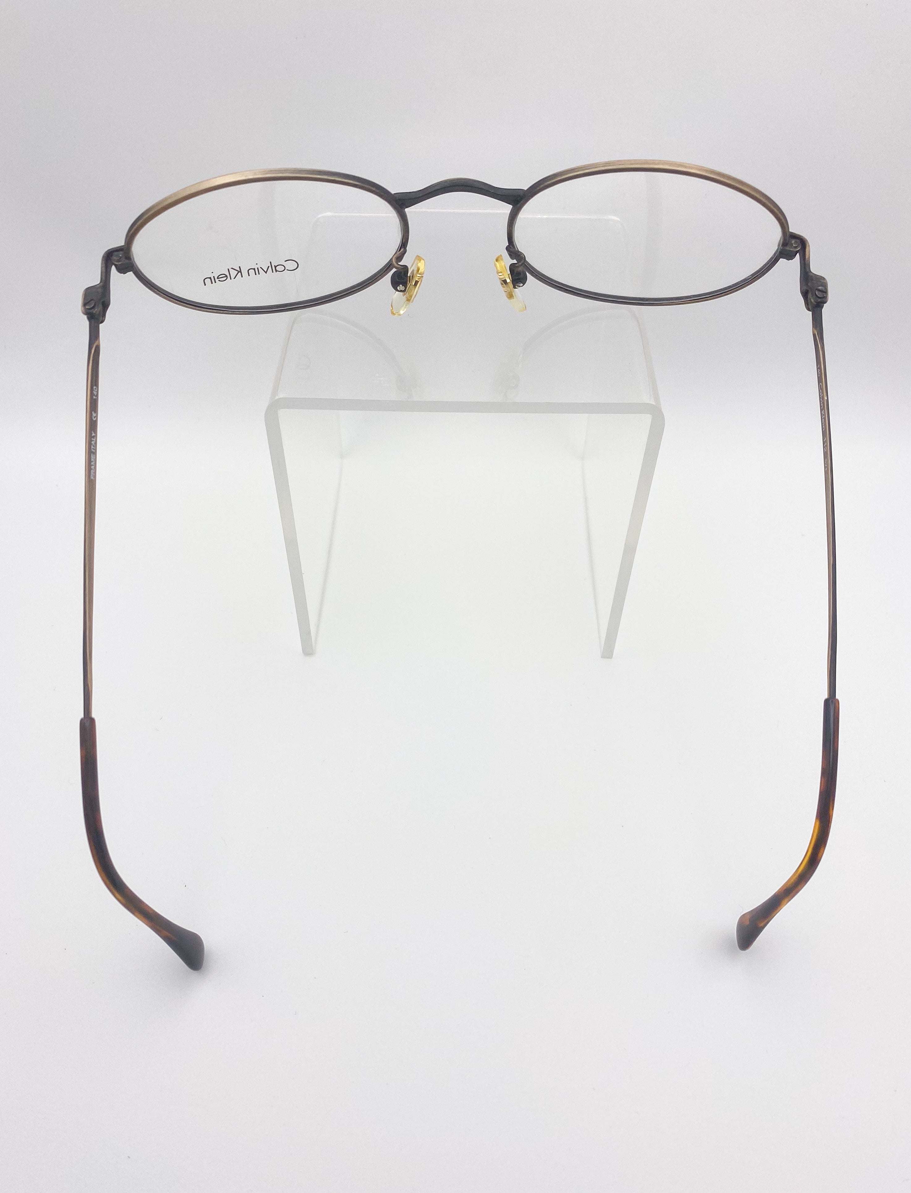 Round metal eyeglasses with a clear background