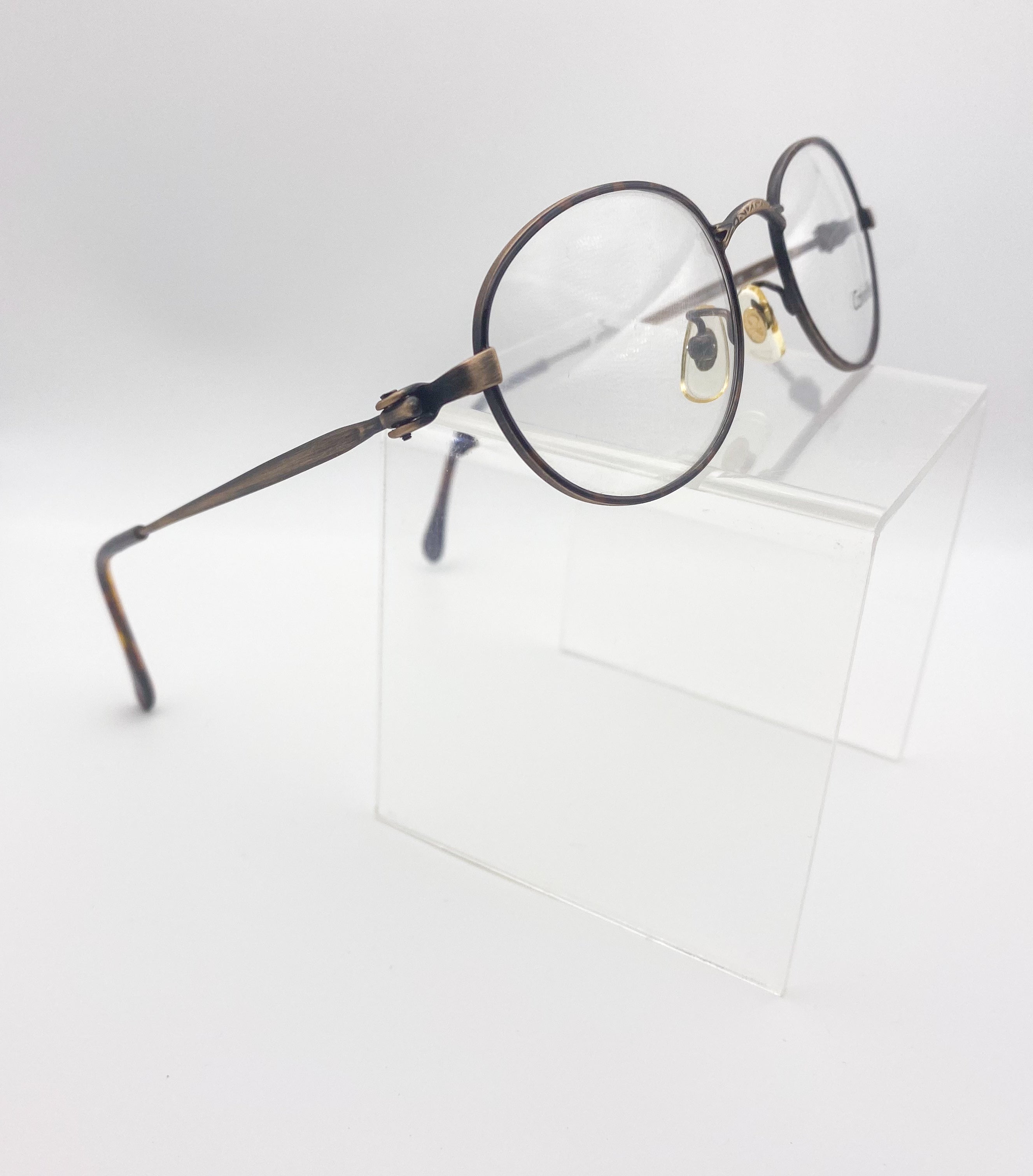 Round eyeglasses on a white background