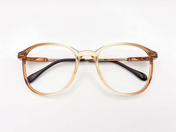Vintage Luxottica brown faded eyeglasses frame on a white background