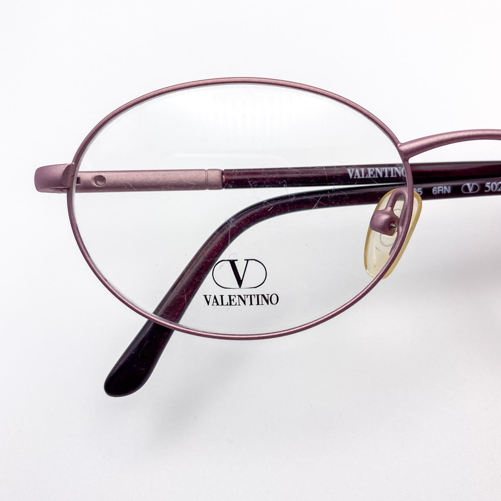 Valentino eyeglasses on a white background