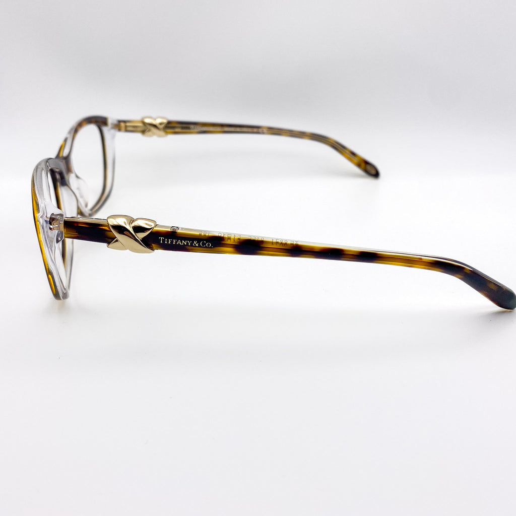 Vintage tortoiseshell eyeglasses with 'Tiffany & Co.' logo on a white background
