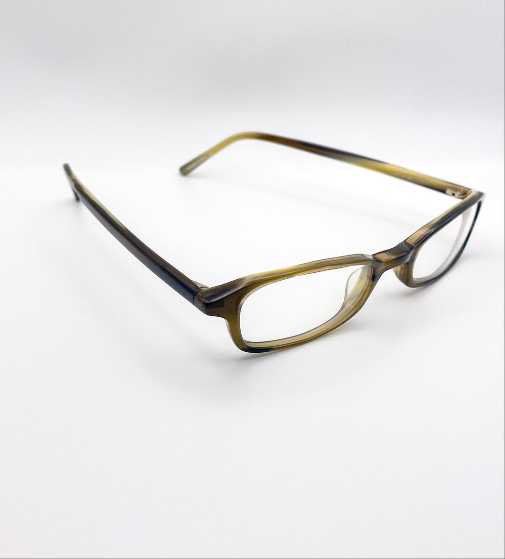 Pair of eyeglasses with a tortoiseshell frame on a white background