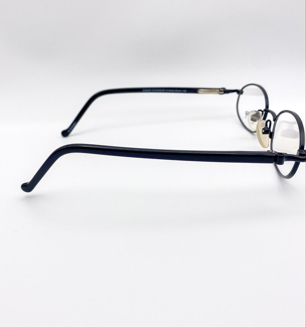 Pair of kids metal eyeglasses on a white background