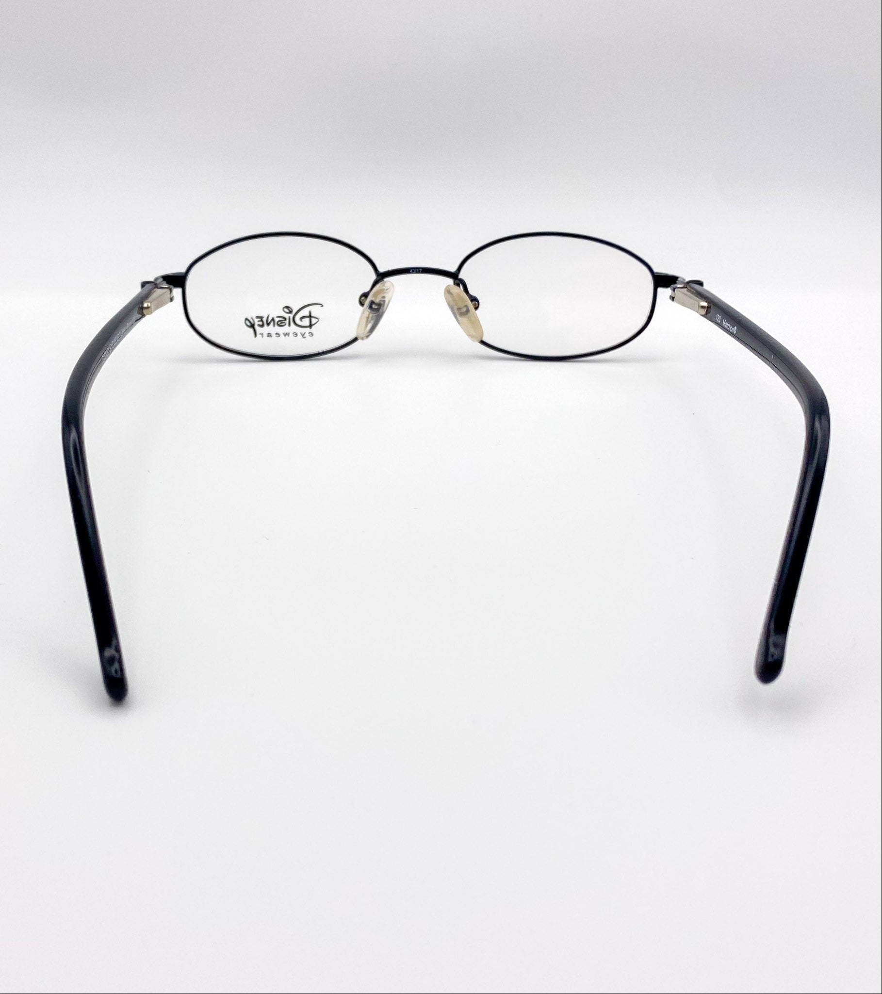 Black eyeglasses with Disney logo on a white background