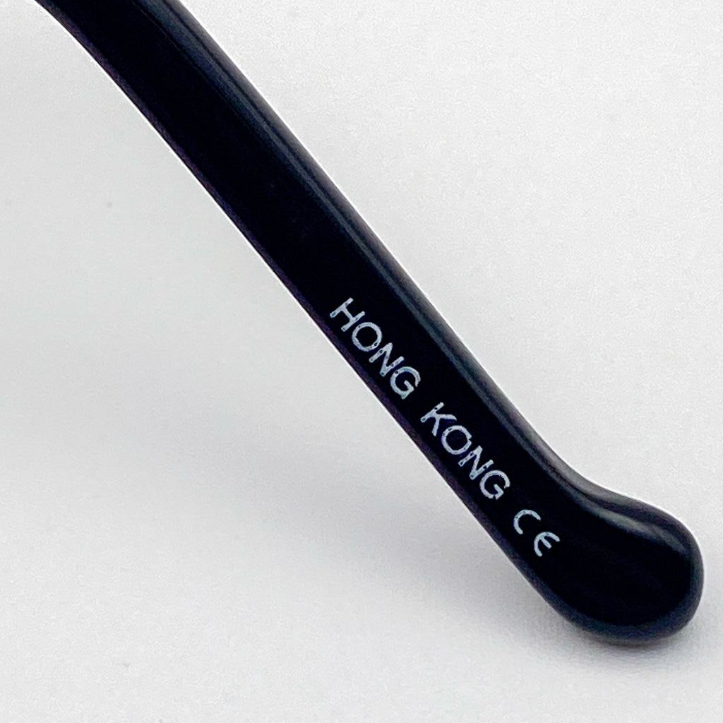 Black eyeglasses temple tip with 'HONG KONG CE' text on a white background