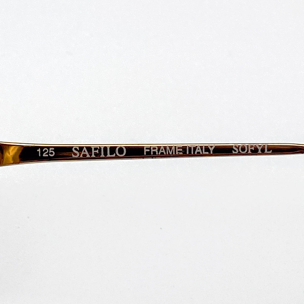 Eyeglass frame with 'Safilo' branding on a white background