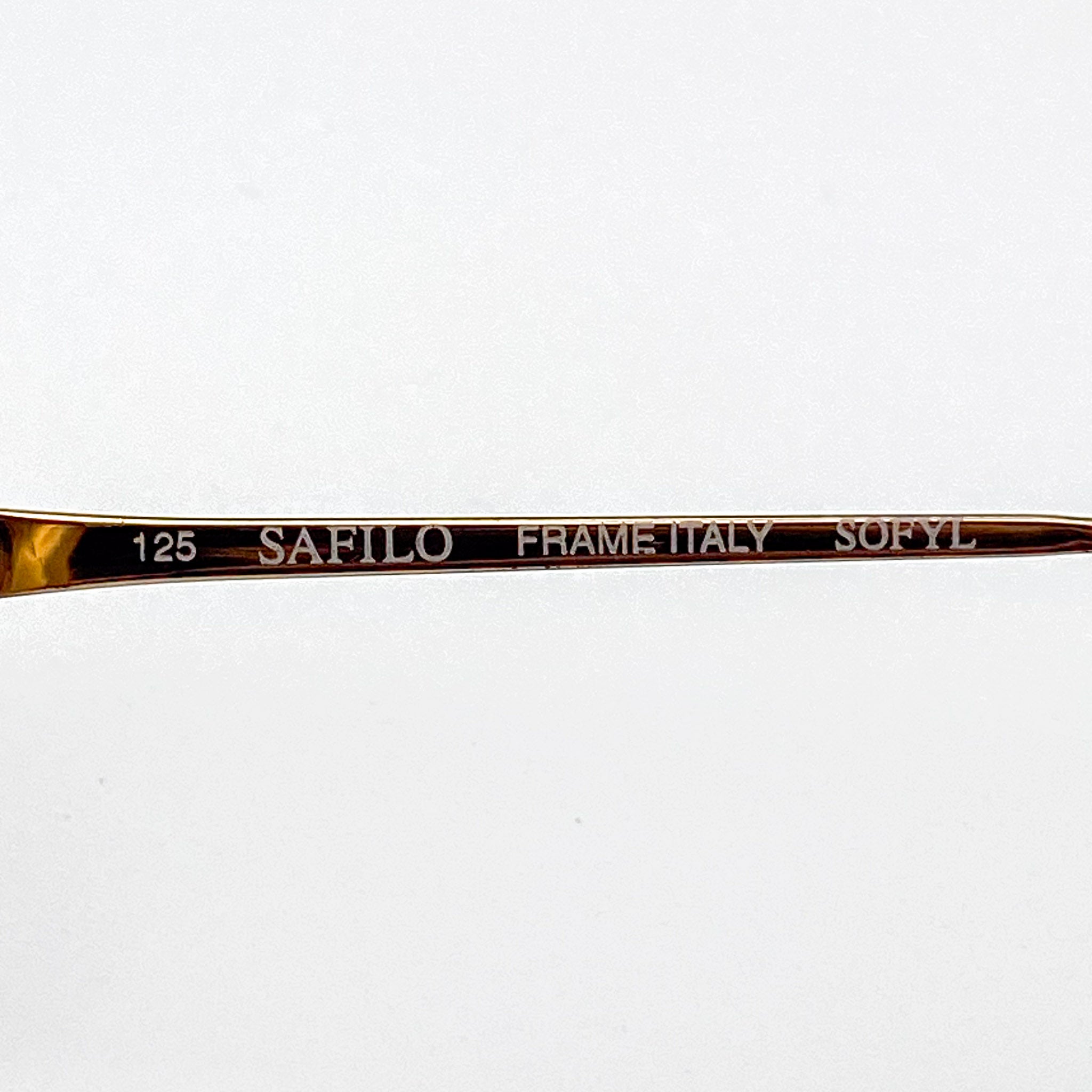 Eyeglass frame with 'Safilo' branding on a white background