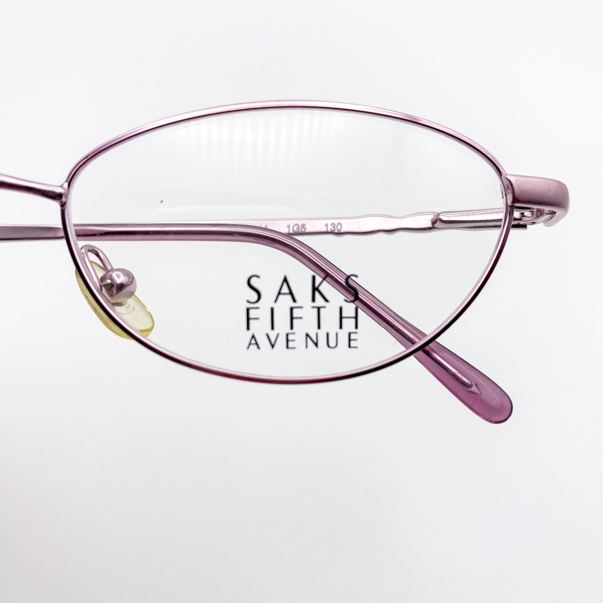 Levender eyeglasses with 'Saks Fifth Avenue' logo on a white background