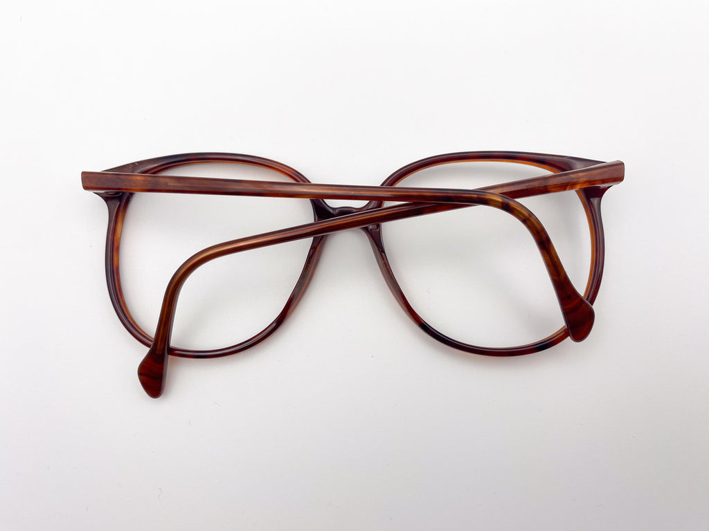 Brown eyeglasses on a white background