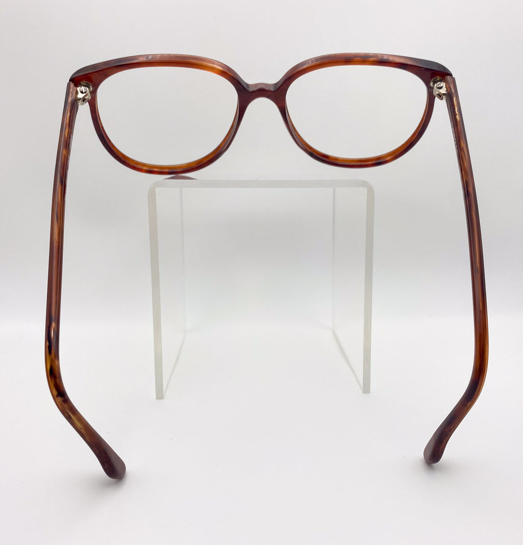 Tortoiseshell eyeglasses on a white background