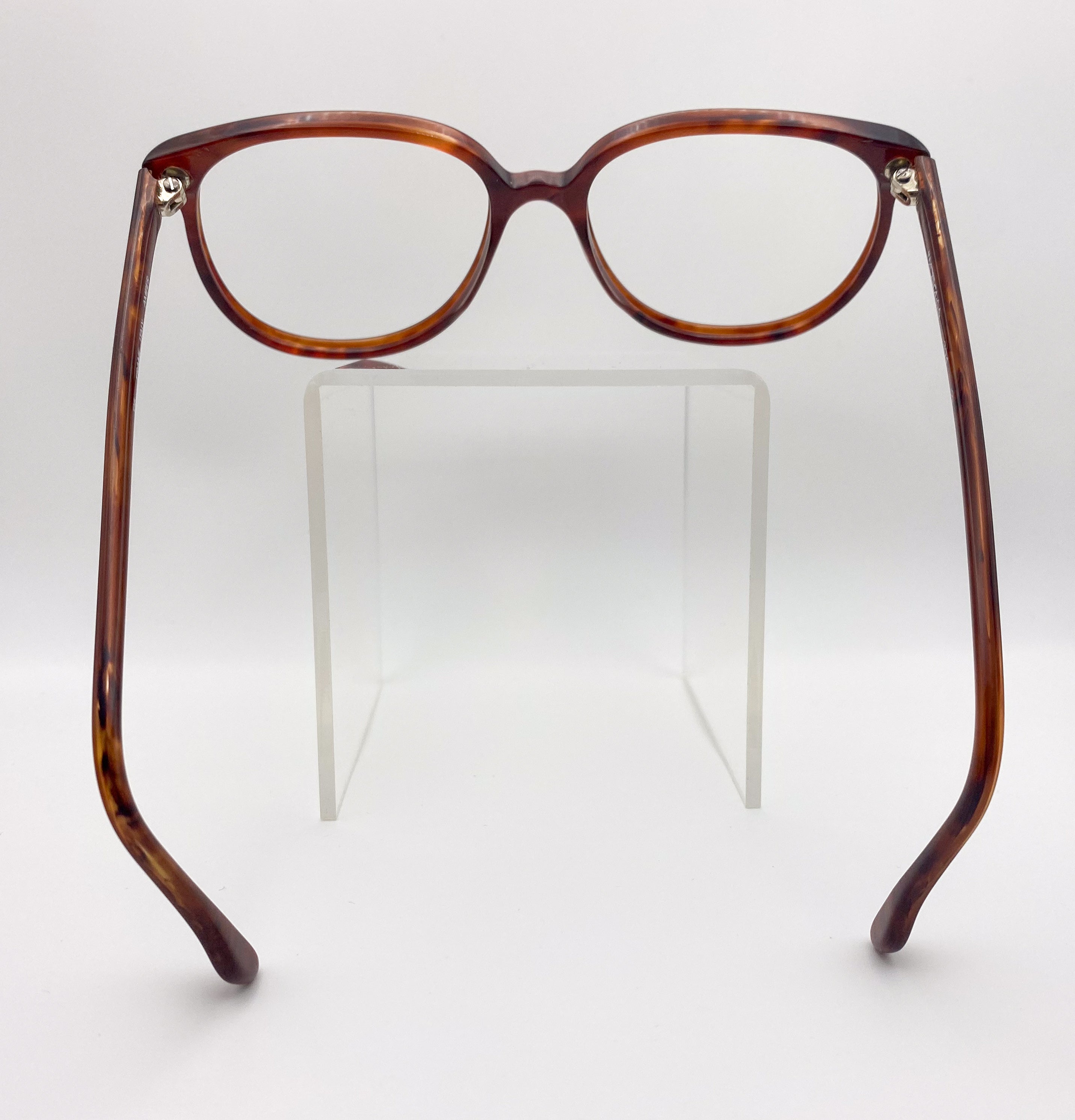 Tortoiseshell eyeglasses on a white background