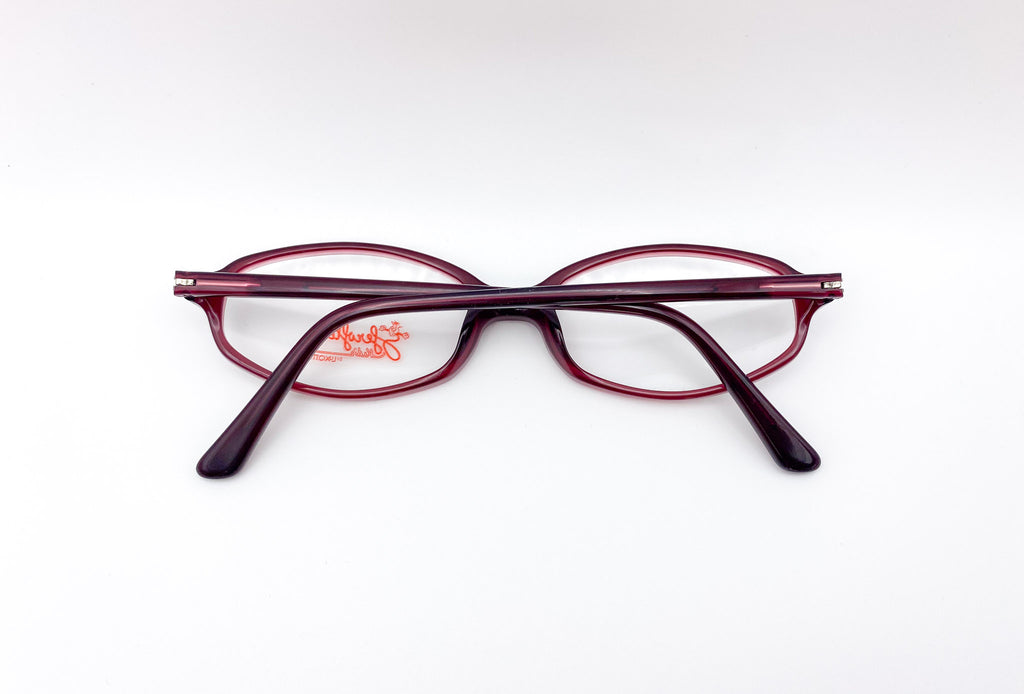 Pair of eyeglasses with a visible brand logo on a white background