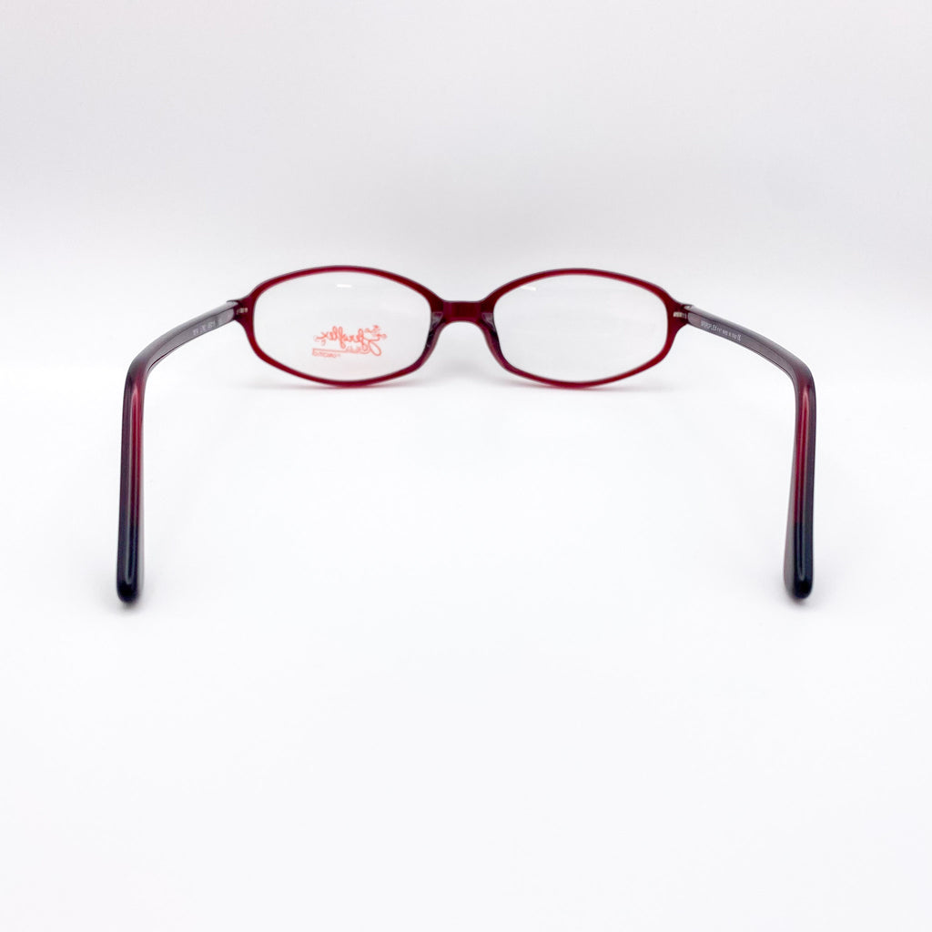 Red eyeglasses on a white background