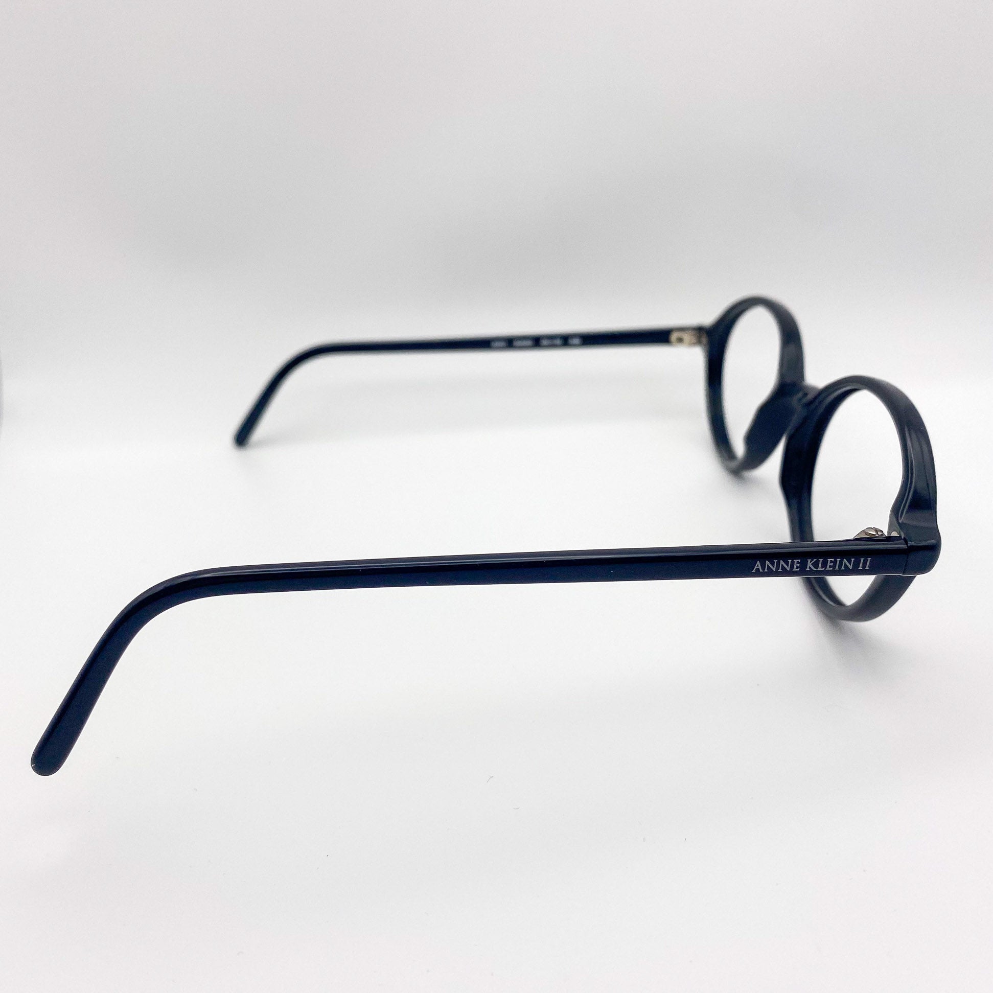 Black eyeglasses on a white background