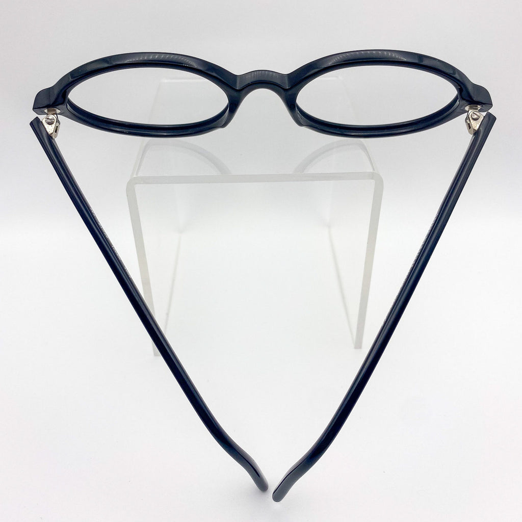 Black eyeglasses on a white background