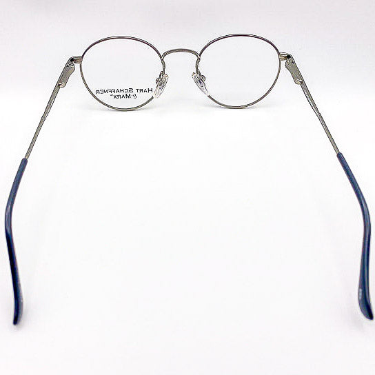 Round eyeglasses with silver frame on a white background