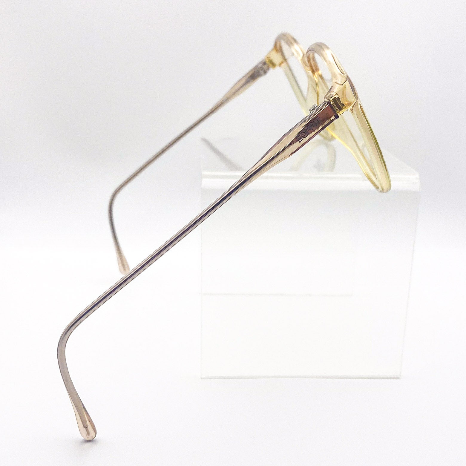 Yellow eyeglasses on a white background