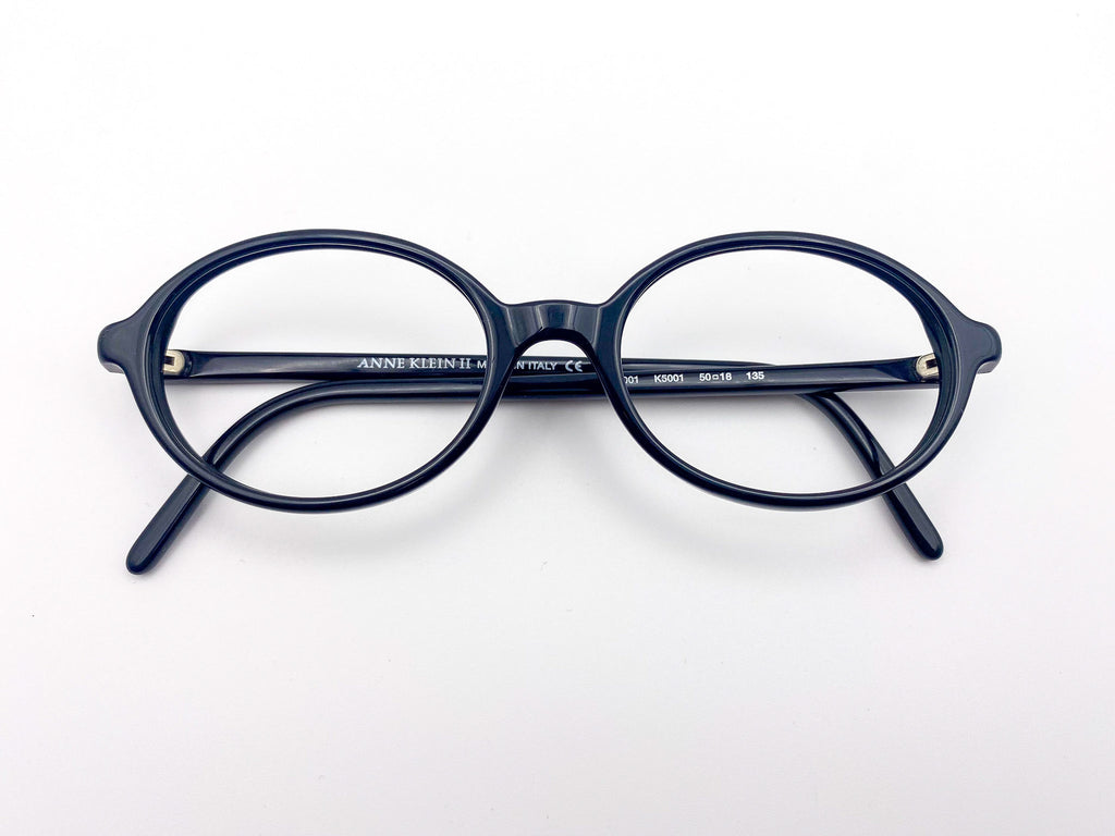 Round black eyeglasses on a white background