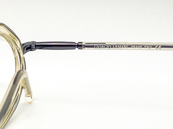 Close-up of a Giorgio Armani eyeglass frame on a white background