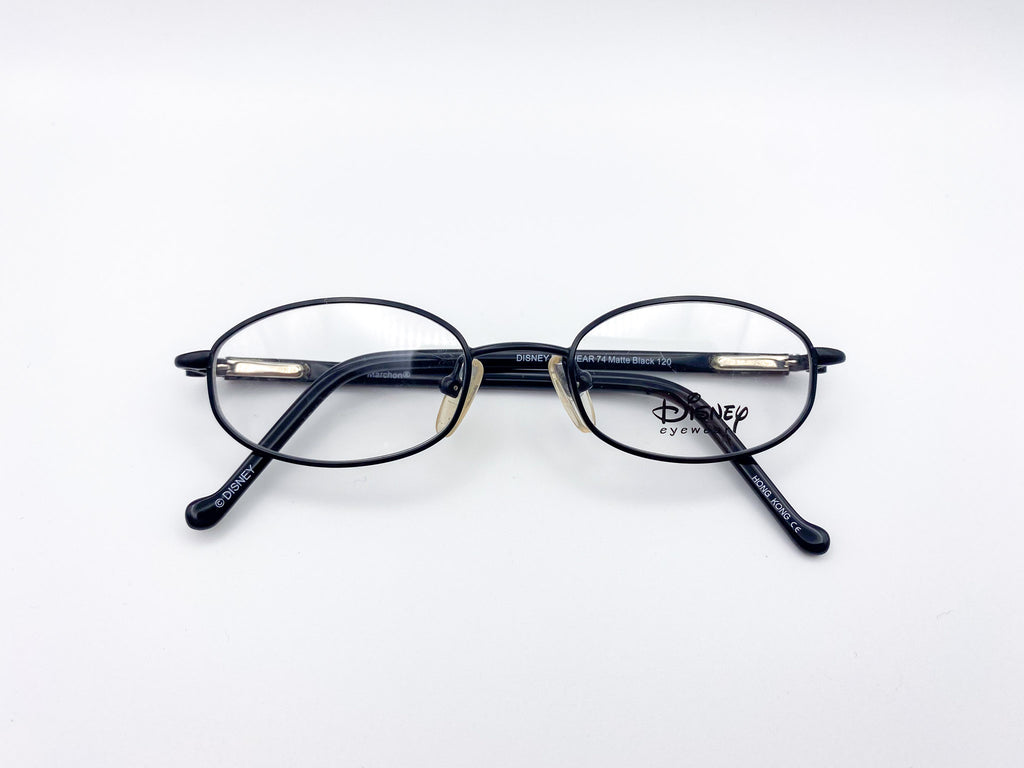 Pair of kids eyeglasses with black frames on a white background