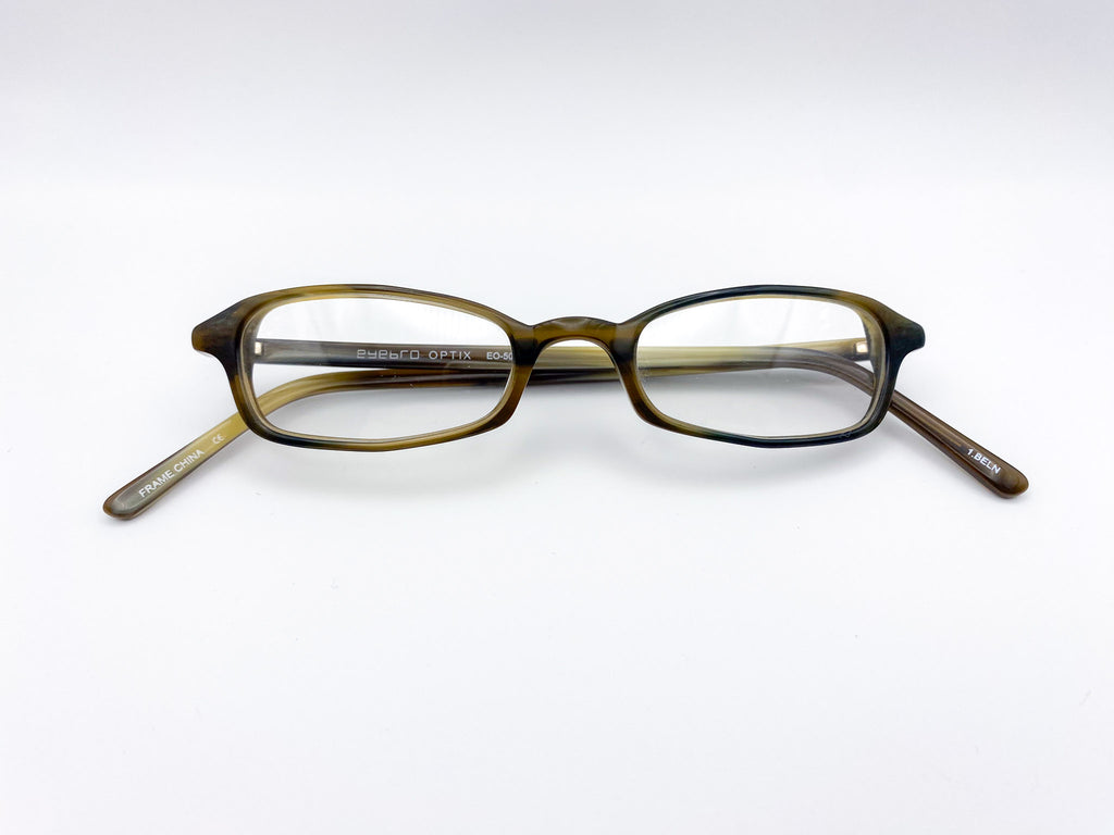 Pair of kids olive green eyeglasses on a white background