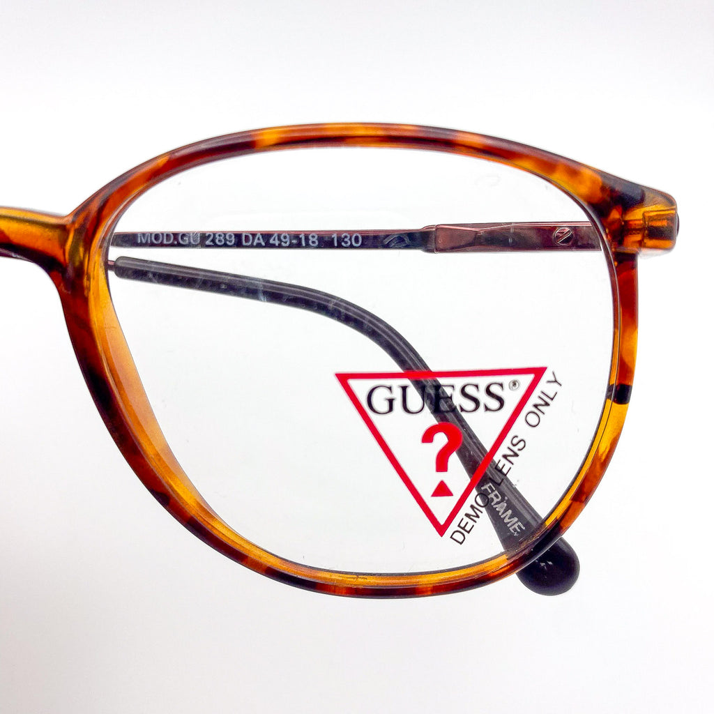 Guess eyeglasses with tortoiseshell frame on a white background