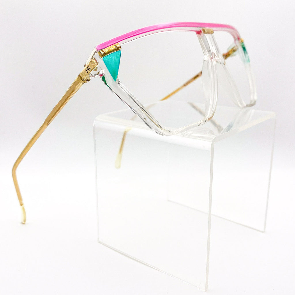 Multicolored eyeglasses on a white background
