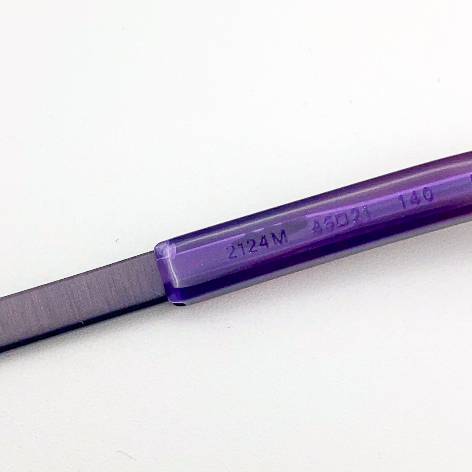 Purple metal temple on a white background