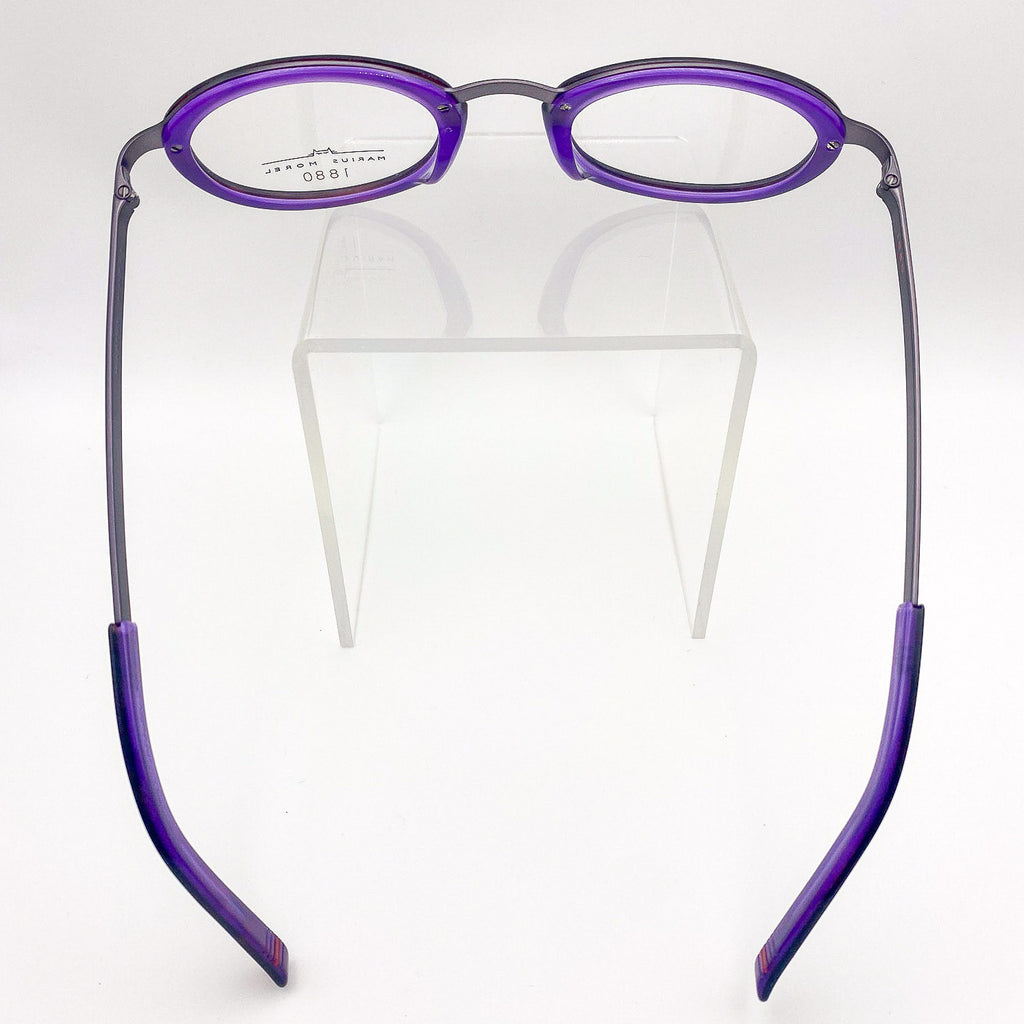 Purple round y2k eyeglasses on a white background