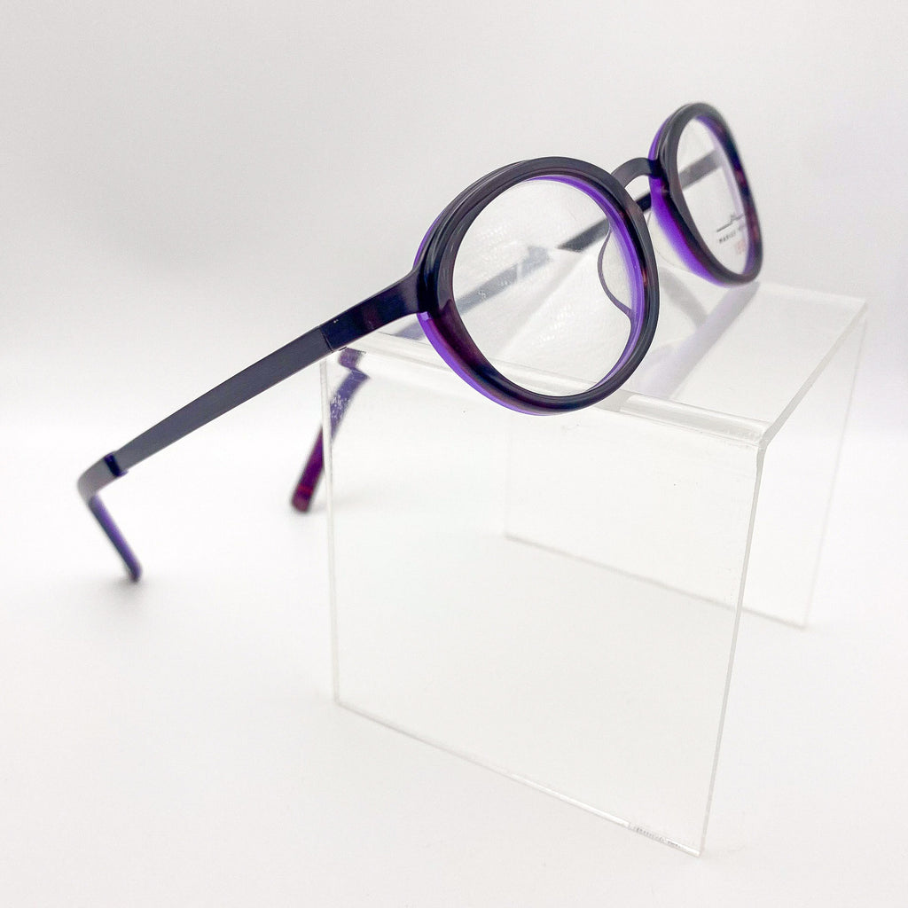 Round panto eyeglasses with purple frame on a white background
