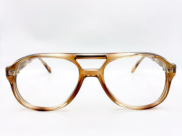 Vintage translucent brown eyeglasses on a white background