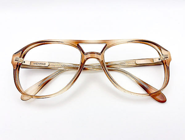 1980s aviator eyeglasses with 'Menrad' branding on a white background