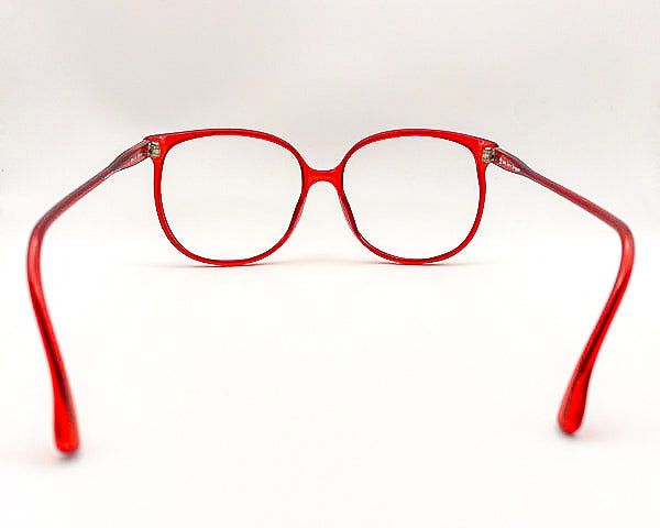 Red eyeglasses on a white background