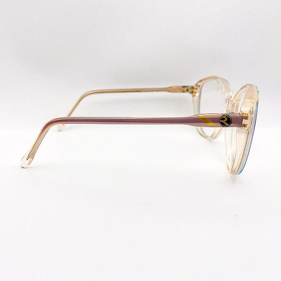 Vintage eyeglasses with a gold frame on a white background