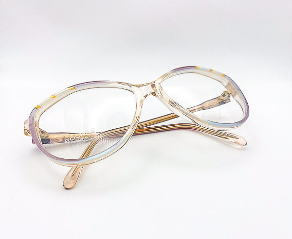 Grandma glasses with a gold frame on a white background