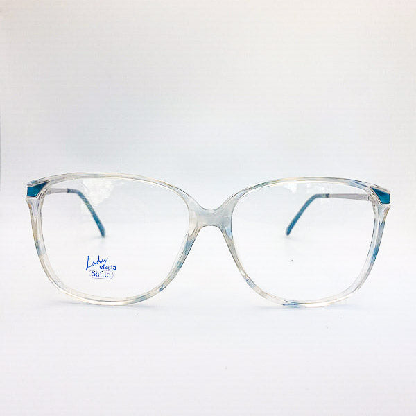 1980s clear eyeglasses with blue accents on a white background