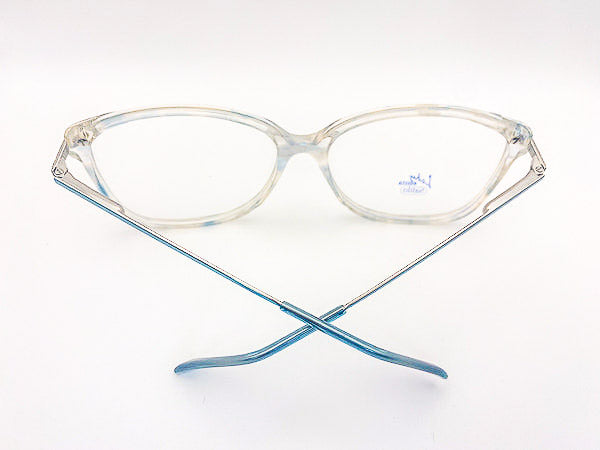 Vintage grandma glasses with a clear blue frame on a white background